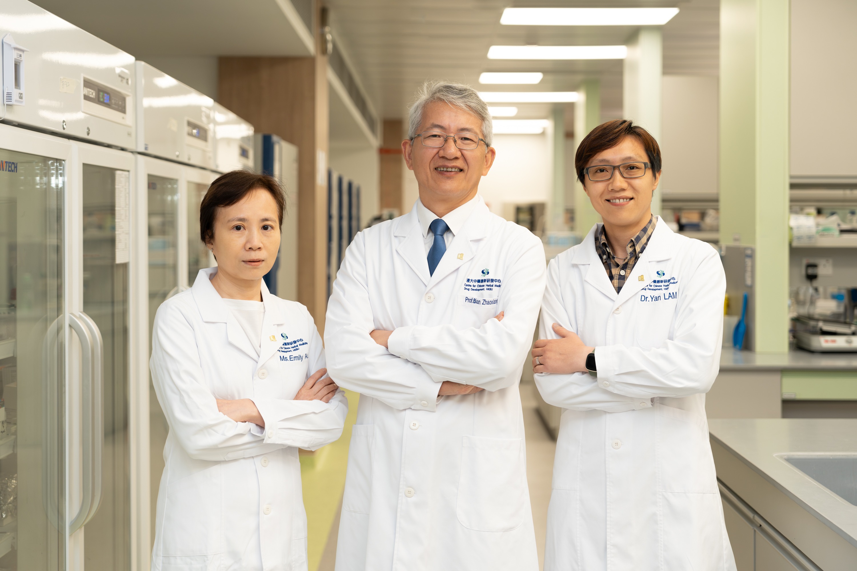 A research team led by Professor Bian Zhaoxiang (middle), Ms Emily Au (left) and Dr Lam Yan-yan (right) develops CDD-2101, a novel Chinese medicine for treating chronic constipation based on the traditional Chinese herbal formulation MaZiRenWan.